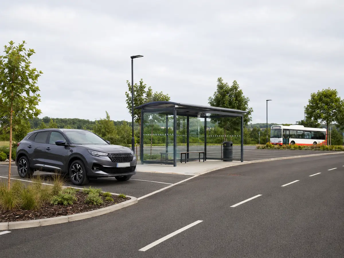 Park and ride site with a bus and parked cars